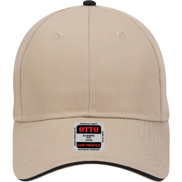 A beige 6 panel low profile baseball cap with a branding tag on the front and a black accent around the visor.