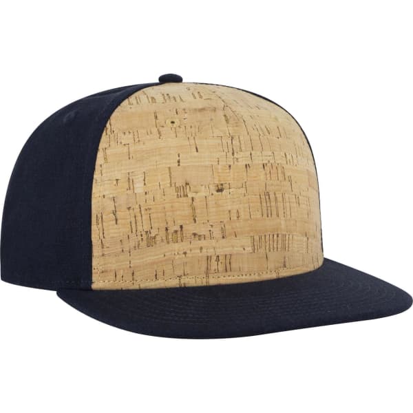 A snapback cap featuring a cork front panel and a navy blue brim and side panels, with a logo on the side.