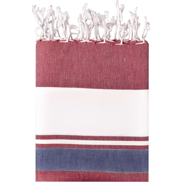 A beach blanket in maroon, white, and navy stripes with a fringed edge and a logo.