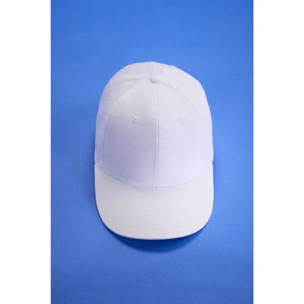 A white 6-panel cap with a curved brim and a logo on the front, set against a blue background.