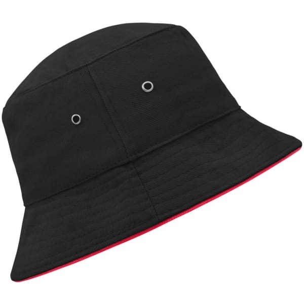 A black bucket hat featuring a red underside and ventilation eyelets, with a branding logo on the side.
