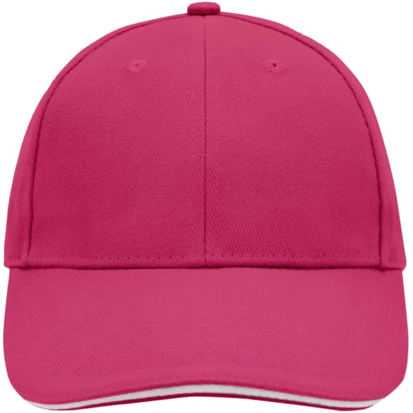 A pink 6 panel sandwich cap with a curved brim and a logo on the front.
