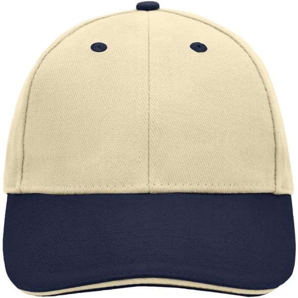 A 6 panel sandwich cap in cream with a navy blue peak and an embroidered logo.