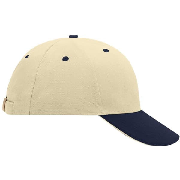 A beige and navy 6 panel sandwich cap featuring a logo on the side.