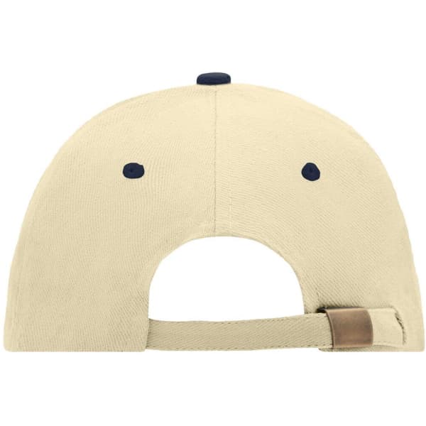 A beige 6 panel sandwich cap with a navy blue button and eyelets, featuring an adjustable strap at the back.