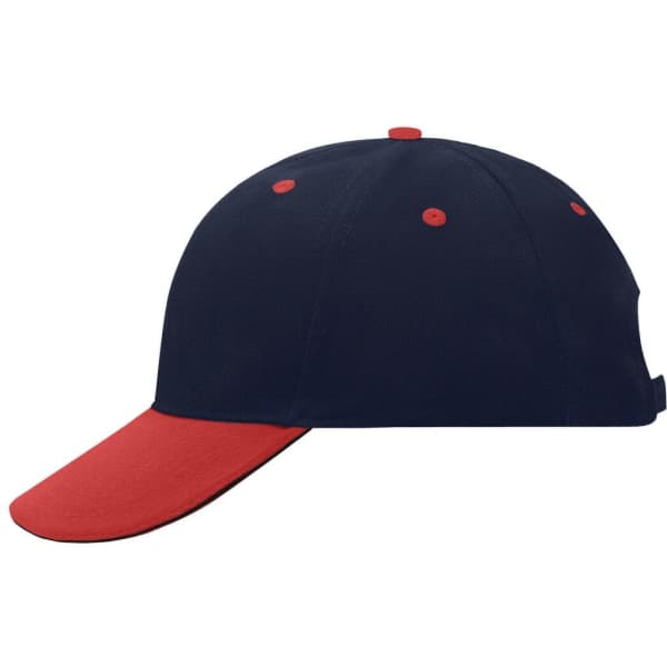 A navy and red 6 panel sandwich cap with a curved brim and contrasting button details. The cap features a logo.