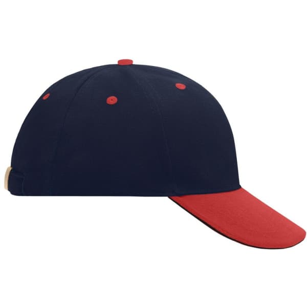 A navy blue and red 6 panel sandwich cap with a curved brim and a branding logo on the side.