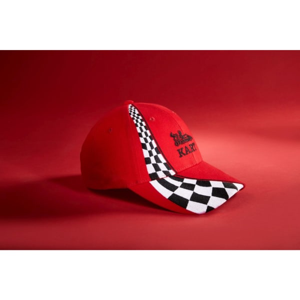 A red racing cap featuring a black and white checkered pattern on the brim and a logo.