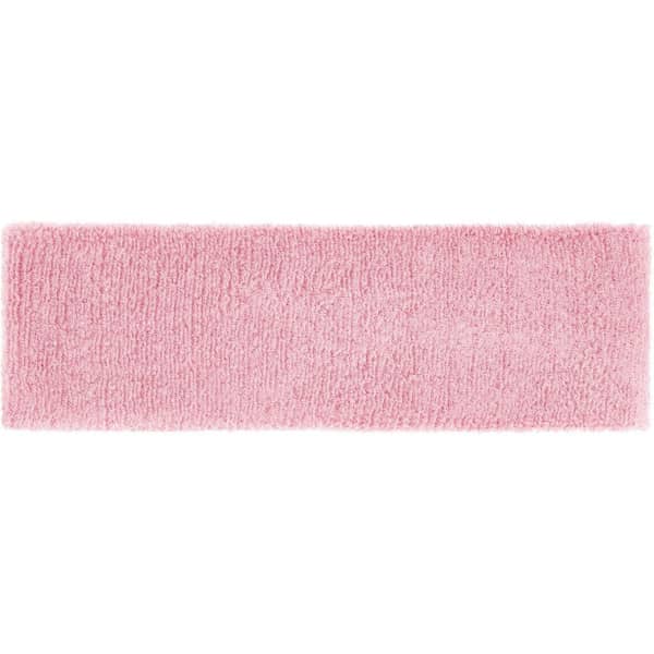 A pink terry headband with a soft, textured surface. It features a logo or branding on it.