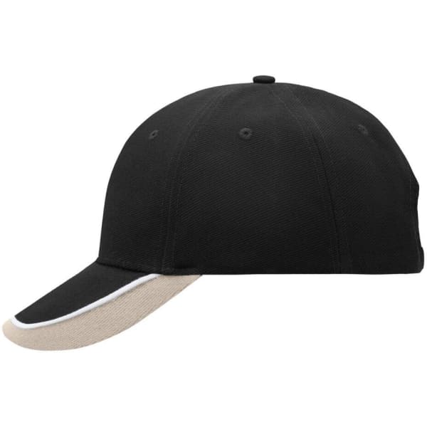A black cap with a beige peak and a subtle logo. The design features ventilation holes on the top.