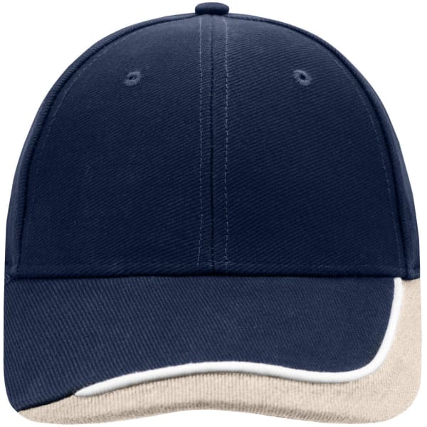A navy cap with a beige brim, featuring a logo on the front and ventilation holes.