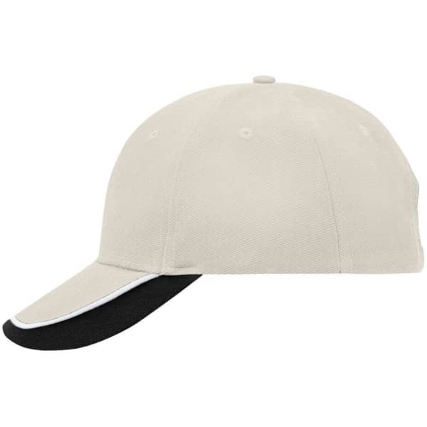 A beige cap with a black peak and white detailing, featuring a logo on the front.