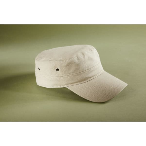 A beige military cap with a flat crown and extended peak, featuring subtle vent holes and a logo.