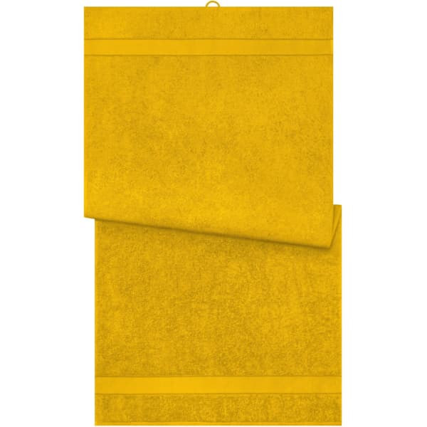 A set of yellow bath towels, featuring a textured design and a hanging loop. Includes two towels stacked.