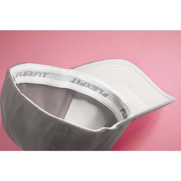 A white Original Flexfit® cap with an interior band featuring the brand name. The cap has a curved peak.