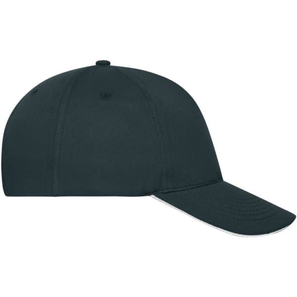 A dark navy 5 panel sandwich cap made from organic cotton, featuring a curved brim and a logo.