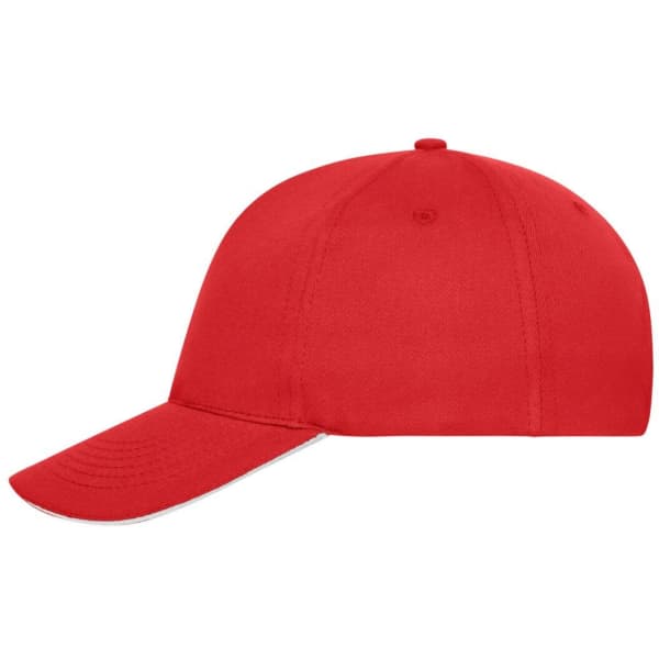 A red five-panel sandwich cap made from organic cotton, featuring a logo on the front.
