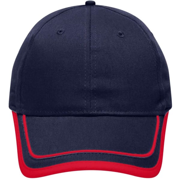 A navy cap with red piping, featuring six panels and a logo on the front.