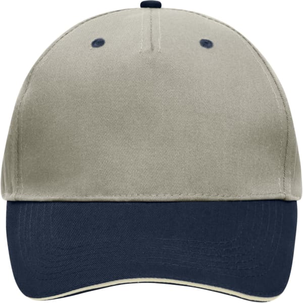 A 5 panel sandwich cap in beige with a navy blue peak, featuring a logo on the front.