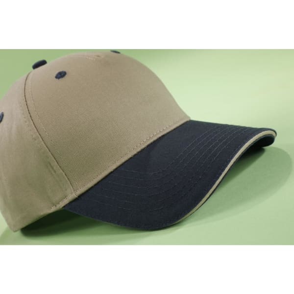 A 5-panel sandwich cap in khaki and navy, featuring a curved brim and a logo on the front.