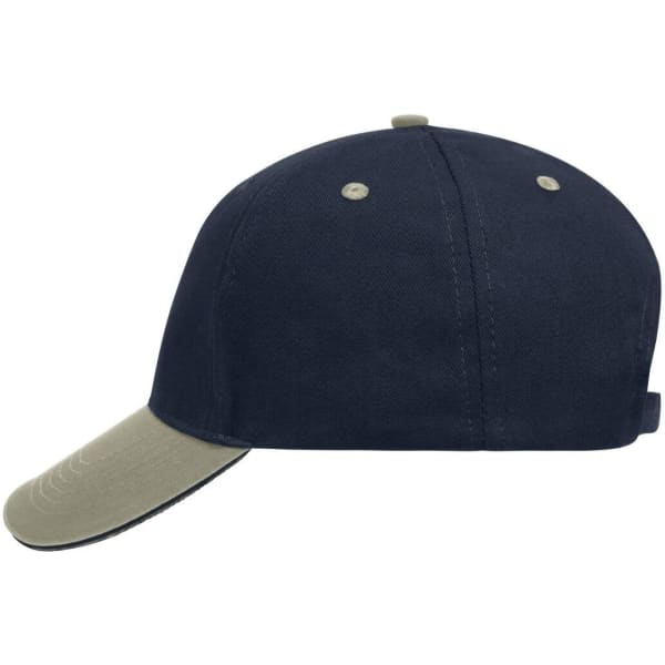 A five-panel cap in navy blue with a beige peak, featuring a logo on the side.