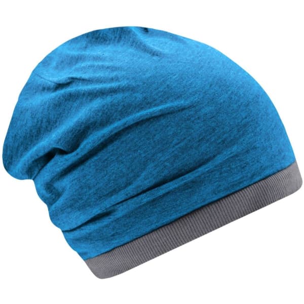 A blue beanie featuring a grey band at the bottom and a soft, textured fabric. The beanie has a relaxed fit.