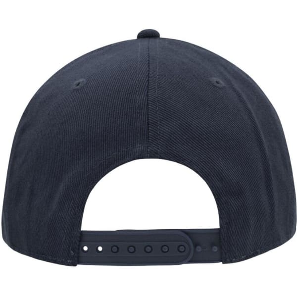 A navy blue cap featuring a six-panel design and an adjustable strap at the back. It has a branded logo.