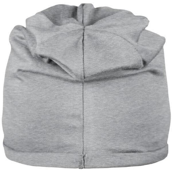 A grey beanie made from bio cotton, featuring a textured design at the top and a logo on one side.