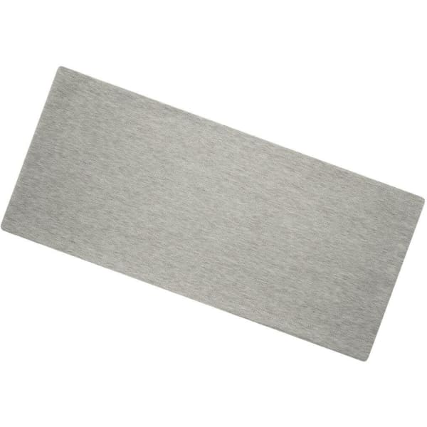 A grey Bio Cotton headband laid flat, featuring a simple design and a logo.