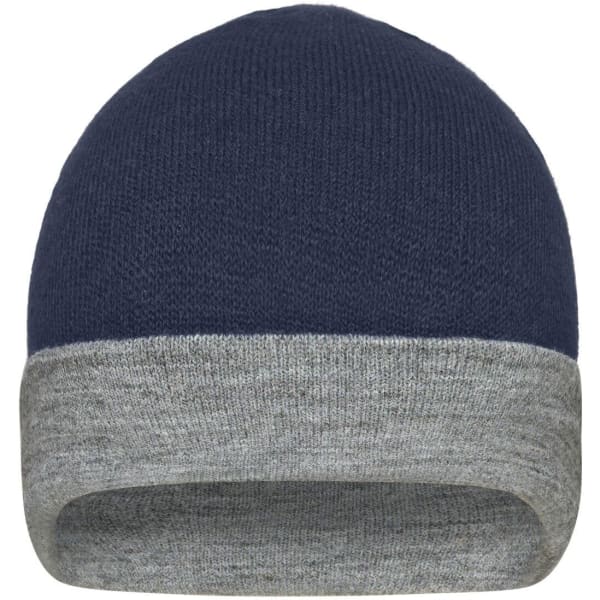 A reversible beanie in navy blue with a grey cuff, featuring a subtle logo on the surface.