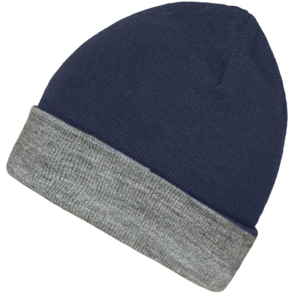 A reversible beanie featuring navy blue and grey colours with a simple design and a logo.