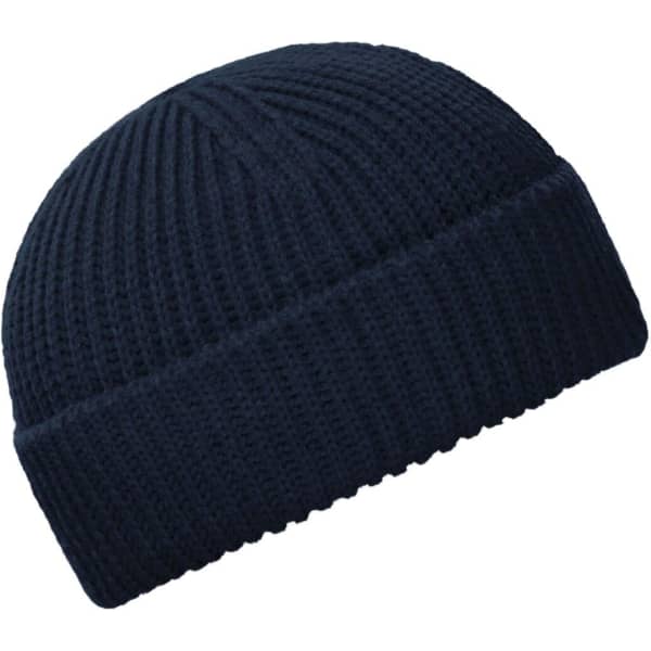 A navy blue fisherman beanie with a ribbed texture, featuring a folded cuff and a subtle logo.