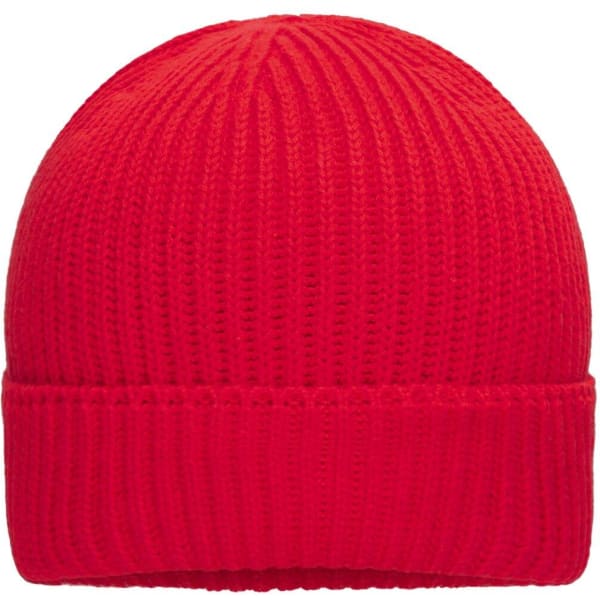 A red knit winter beanie featuring a ribbed design and a folded cuff. It has a logo on the side.