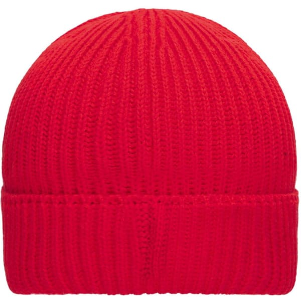 A red knitted beanie featuring a ribbed texture and a fold-over cuff, with a logo on the side.