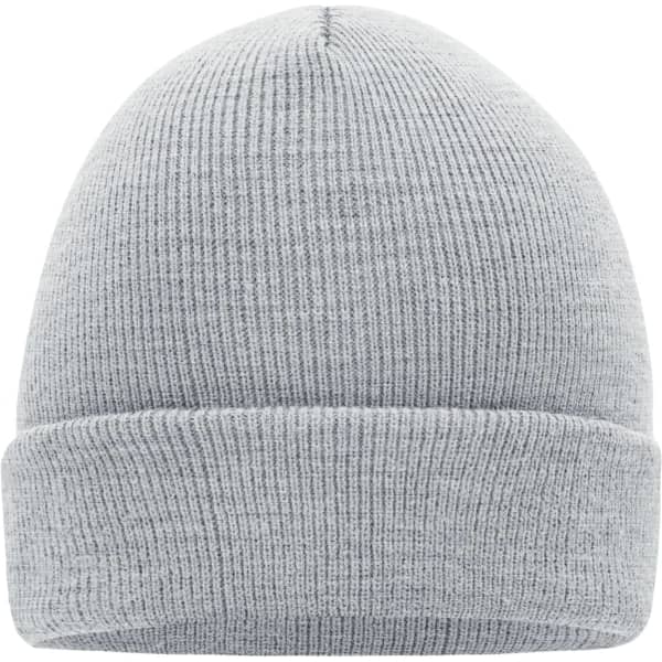 A grey knitted beanie with a rolled cuff and a smooth texture. It features a logo on the side.
