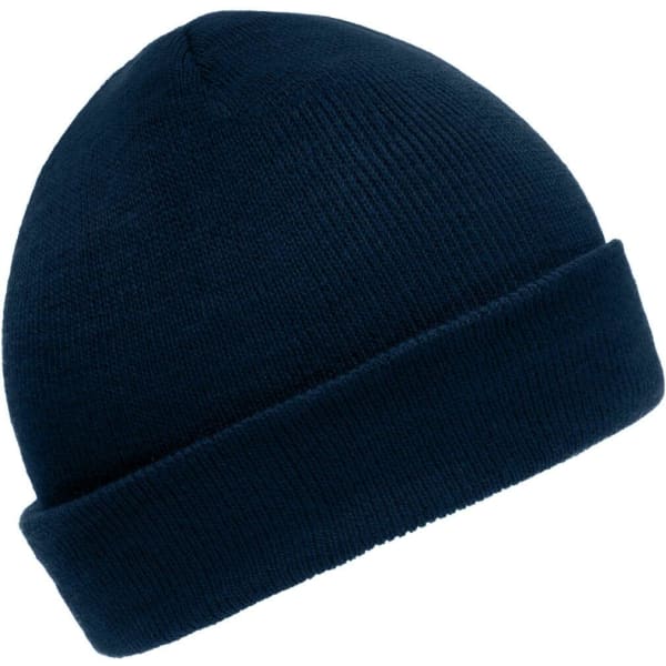 A navy knitted beanie with a rolled cuff and a plain design. It features a logo on one side.