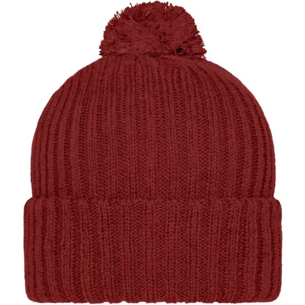 A knitted beanie in a deep red colour with a fluffy pompon on top. It has a ribbed texture and a folded brim.