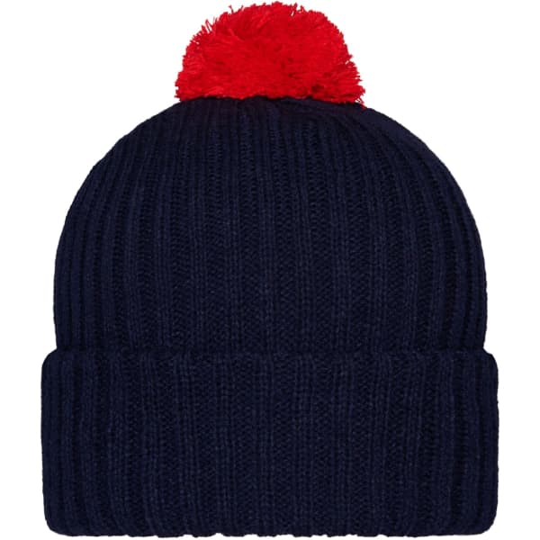A navy knitted beanie with a red pompon on top. It features a ribbed texture and includes a logo.