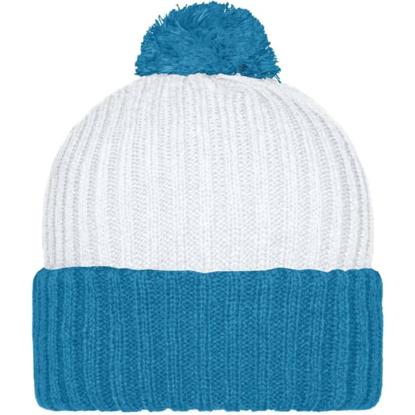 A knitted beanie with a blue and white design, featuring a fluffy pompon on top. It has a textured ribbed pattern.