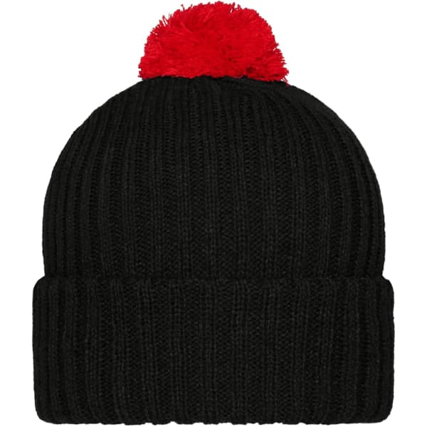 A black knitted beanie with a red pompon on top and a ribbed texture. It features a logo on the side.