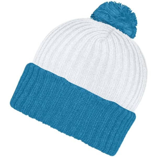 A knitted beanie with a white body and a teal blue ribbed band, topped with a matching pompon. It features a logo.