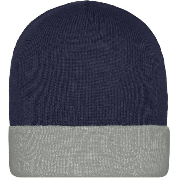 A knitted beanie in navy with a grey cuff. The beanie has a simple design and features a logo.
