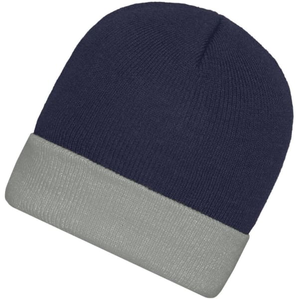 A knitted beanie featuring a navy top and a grey cuff, with a logo on the side.
