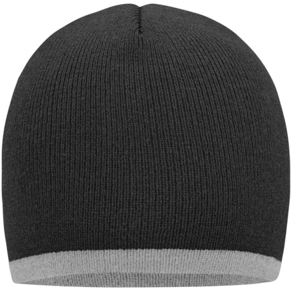 A beanie with a black body and a grey contrast edge. Features a ribbed texture and has a branded logo.