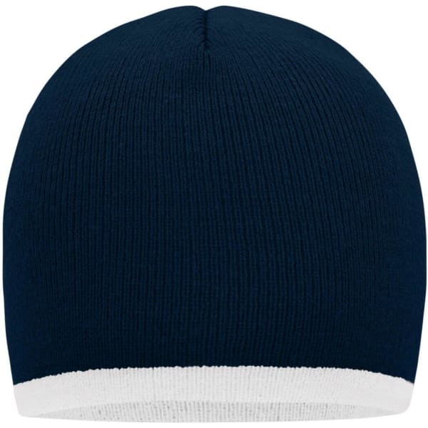 A beanie in navy blue with a white contrast edge, featuring a knitted texture and a rounded top.
