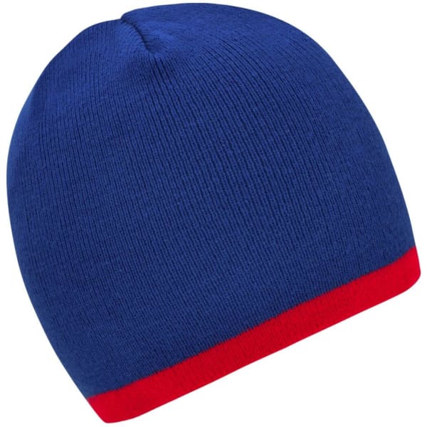 A blue beanie with a red contrast edge, featuring a logo.