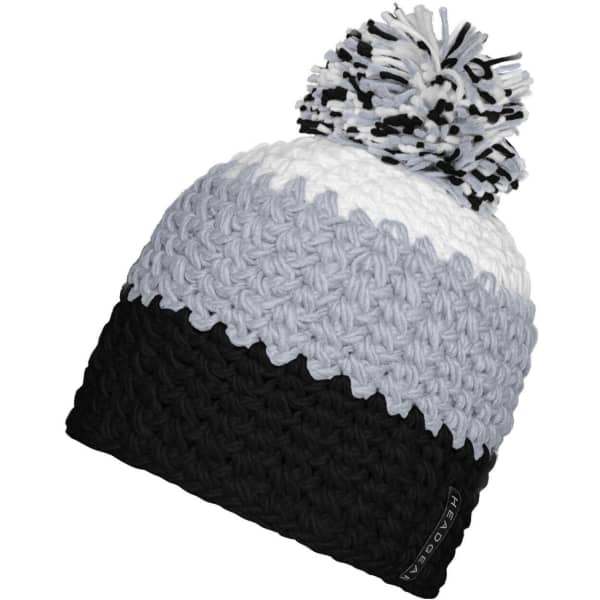 A beanie with a pompon, featuring black, white, and grey colours, with a logo on the side.