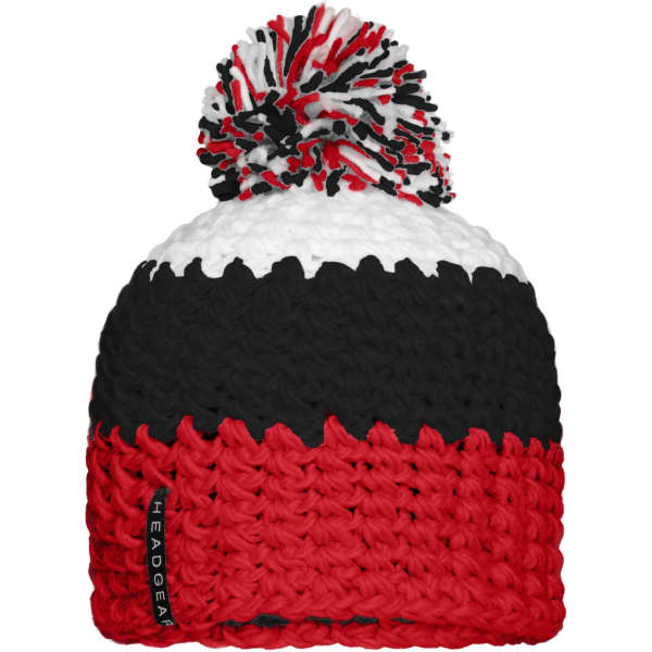 A beanie with a pompon, featuring red, black, and white colours, with a logo on the side.