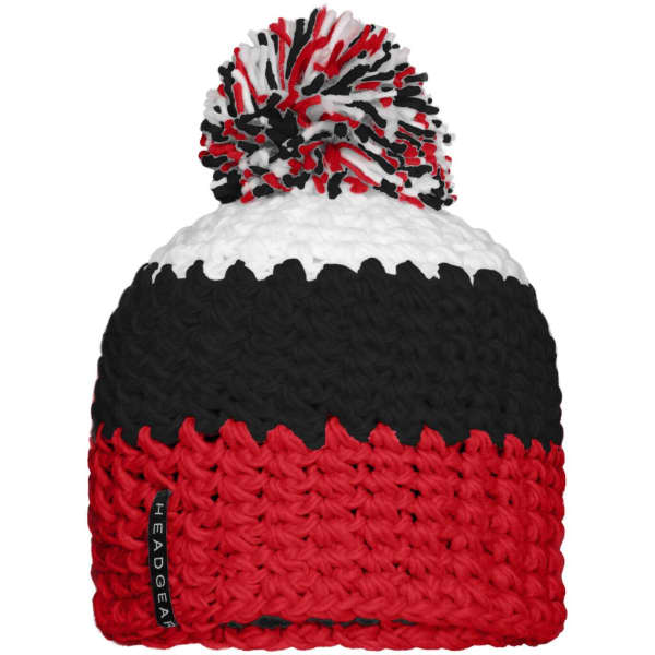 A beanie with a pompon featuring red, black, and white stripes, and a branding label on the side.