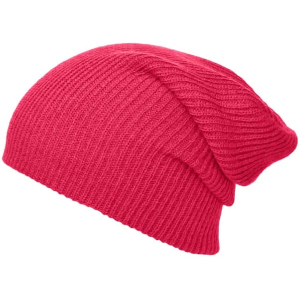 A knitted long beanie in bright pink, featuring a ribbed texture and a relaxed fit. It has a logo on the side.